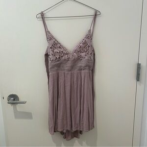 cute mini dress 
ties in the back
brand ocean drive
size medium